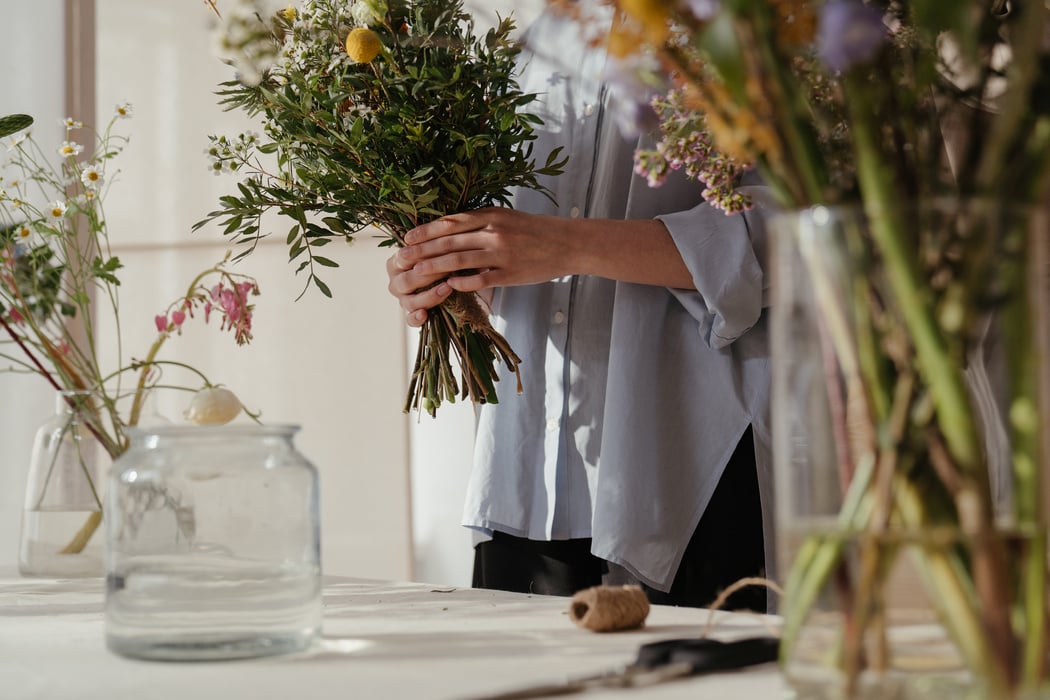 Person Holding Yellow Flower Bouquet